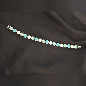 Authentic TOUCHSTONE Silver SS W\blues/white SWAROVSKI stones, Sz 7.5